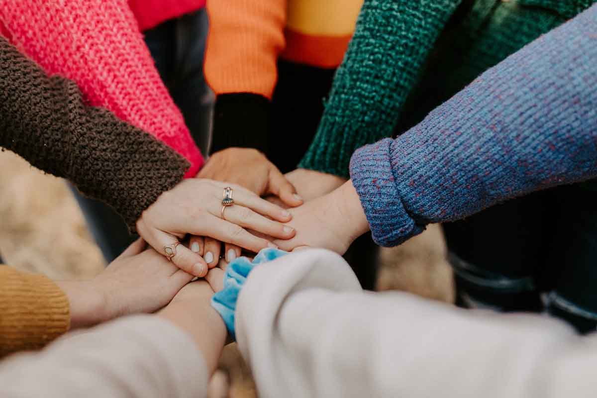 a group of people during a 12-step meeting