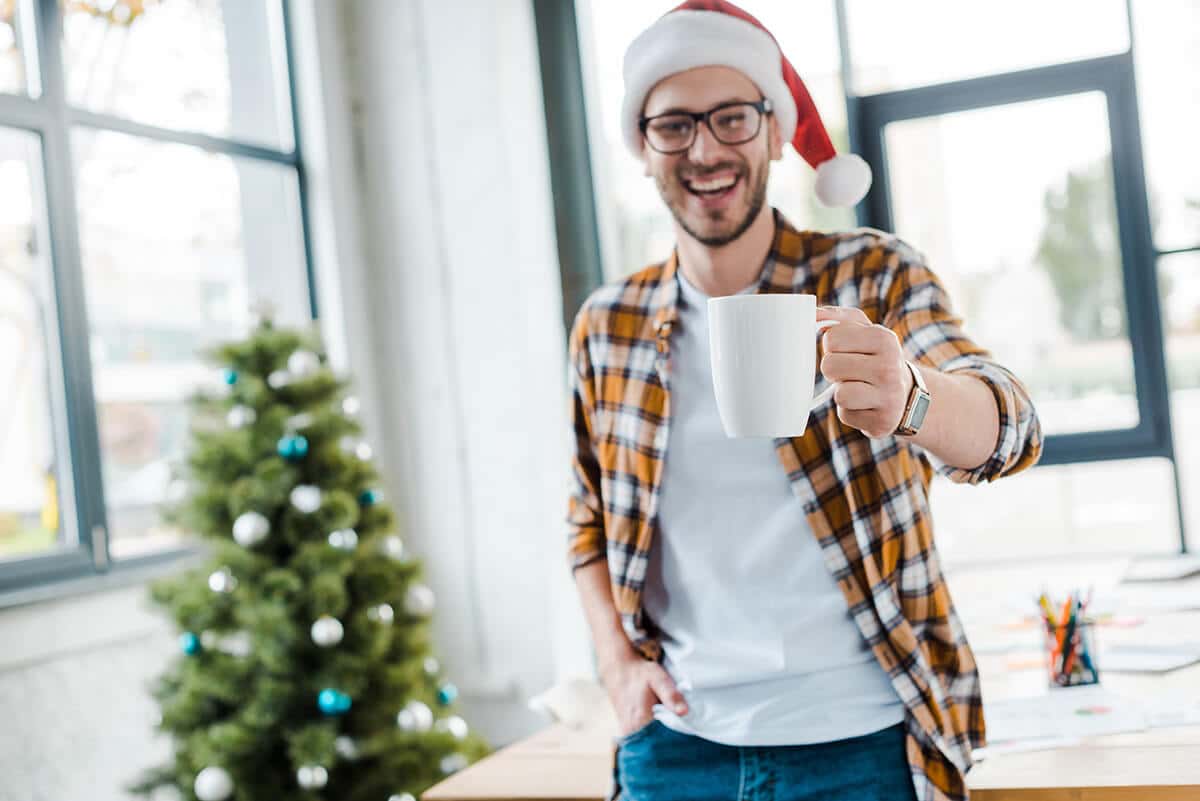 a man enjoys celebrating Christmas and New Year without alcohol drinking.