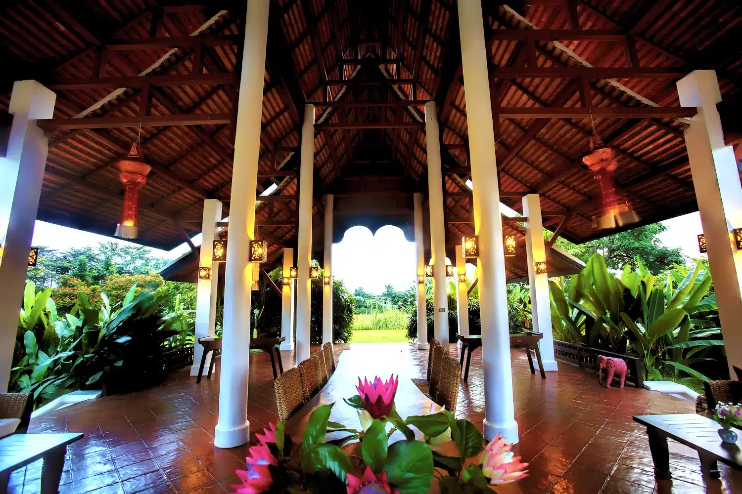 Open-air pavilion with wooden beams at The Dawn.